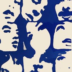 a blue and white painting with multiple faces