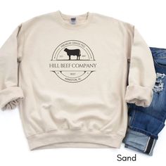 a white sweatshirt with the words hill beef company on it and an image of a cow