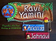 a wooden sign that says ravi yammi and another name hanging from it's side