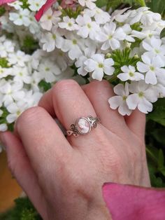 An enchanting sterling silver cameo ring that features a classic portrait of a vintage lady. Version 1 has the cameo set in a bezel setting with beautiful scrollwork detailing and a heart cutout on each shoulder of this show-stopping ring. Version 2 has a prong-set cameo flanked by a delicate cross-over design. SIZE: This ring is adjustable, which is convenient if you aren't sure what size your recipient's finger is or if you like wearing rings on different fingers. To resize the ring, simply sl Victorian Cameo Rings As Gift, Victorian Rings Stamped 925, White Cameo Rings For Wedding, Elegant White Cameo Ring, White Cameo Wedding Rings, Sterling Silver Cameo Jewelry For Anniversary, Classic Cameo Rings As A Gift, Classic Cameo Rings As Gift, Classic Cameo Rings Gift