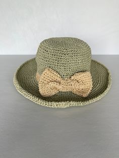 Handmade. Made in Turkey. Hand Crocheted sun hats in various green and yellow color tones. One Size Fits Most. Head Circumference: 22'' Crown Height: 3.5-4'' Brim Wide: 3-3.5'' Material: 100% Paper Straw Spot-clean your Paper Hats using a damp cloth. Two sisters lovingly make elegant handmade products for you. Green Crochet Bohemian Bucket Hat, Green Adjustable Cloche Hat With Short Brim, Adjustable Green Brimmed Cloche Hat, Adjustable Green Cloche Hat With Short Brim, Adjustable Green Panama Hat, Adjustable Crochet Straw Hat, Adjustable Green Brimmed Boater Hat, Adjustable Vintage Crochet Hat For Vacation, Green Straw Sun Hat With Curved Brim