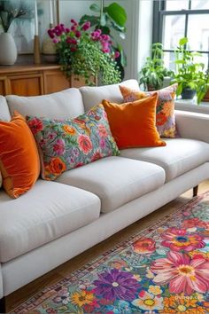 a living room filled with furniture and lots of flowers