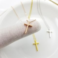 Dainty cross necklace. Christian Religious necklace. Made of solid sterling silver, rhodium, 18k gold, or rose gold plated over sterling silver. Size: 10mm * 16mm Thickness: 3.2mm Hole size: 1.5mm Color: Silver, Gold, Rose Gold Chain: box chain Length of necklace: choose at drop down menu. Minimalist Cross Pendant Necklace For First Communion, Crucifix Cross Necklace With Clavicle Chain As Gift, Minimalist Personalized Cross Necklace, Cross Necklace For First Communion, Elegant Cross Necklace For Confirmation, Delicate Chain Rose Gold Cross Necklace, Dainty Cross Necklace For First Communion, Rose Gold Crucifix Necklace As Gift, Rose Gold Cross Necklace With Delicate Chain