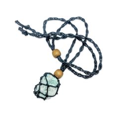 Mesmerizing Mesh Gemstone Necklace with Amazonite - Elevate Your Style with Natural Elegance Introducing the Necklace - Mesh Gemstone - Amazonite! This stunning piece features a braided rope pendant in the shape of a braided cage, holding a raw gemstone that will make you stand out from the crowd. The Amazonite gemstone not only looks beautiful but also has calming and soothing properties. It is said to help with communication and balance, making it the perfect accessory for those stressful days Bohemian Crystal Necklaces With Raw Stone, Handmade Cord Spiritual Jewelry, Bohemian Necklace With Large Adjustable Stone, Bohemian Adjustable Crystal Necklaces With Raw Stone, Handmade Cord Jewelry Gift, Bohemian Adjustable Raw Stone Necklace, Spiritual Jewelry With Natural Stones And Waxed Cord, Adjustable Bohemian Necklace With Raw Stone, Spiritual Jewelry With Natural Stones On Waxed Cord