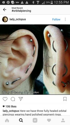 an ear with two different piercings attached to the top and bottom of each ear