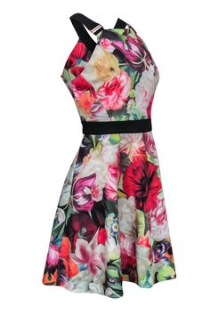 Grab this fabulous floral frock from Ted Baker for a bright and artistic look! Made with the brand's iconic printed material, this A-line cocktail dress will elevate any simple pair of heels, from sandals to pumps! Size 10 (Ted Baker 4) 88% Polyester, 12% Elastane A-line silhouette High neckline Thick straps with buckle accent Zippered back Very small stain inside skirt Waist 31" Bust 34" Total length 36" Floral Frocks, A Line Cocktail Dress, High Neckline, Ted Baker, A Line Dress, A Line, Two Piece Skirt Set, Floral Print, Cocktail Dress