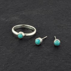 That’s it. Looks like you’ve already fallen for these tiny turquoise stud earrings. Who can resist their vivid pop of color and perfectly round shape? A fun twist on the classic stud theme, these cuties will be with you day and night. Call it love at first sight. Wear it with a matching ring. Gemstone - Genuine Turquoise 925 Sterling silver High polish finish Approx. 4mm Handmade in Taxco, Mexico Outfits Matching, Southern Outfits, Turquoise Stud Earrings, Earrings Gemstone, Simple Ring, Matching Ring, Turquoise Stones, Matching Rings, Genuine Turquoise