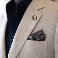 FREE SHIPPING ON THIS ITEM!  Imagine the significance as your groom wears this pin, keeping a cherished memory close to his heart as you embark on your journey together. It's a gesture that speaks volumes, symbolizing the depth of your love and the importance of honoring those who hold a special place in your hearts. Celebrate your special day with a heartfelt token of remembrance. Our Gold Photo Memorial Pin is more than just an accessory; it's a symbol of enduring love and cherished memories. Classic Gold Lapel Pin For Wedding, Gold Brooches For Groom, Personalized Elegant Wedding Brooches, Elegant Personalized Wedding Brooches, Groom Pin, Groom Boutonniere, Photo Pin, Losing A Loved One, Groom Wear