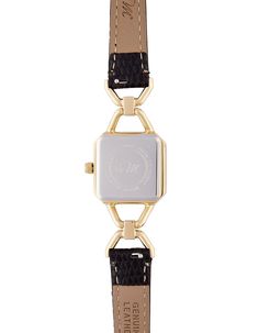 This luxurious watch has a clean and sophisticated look. The square watch dial features a minimalist design. If you look closely, the cut glass on the watch dial gives an added touch of style while the small watch face appears almost like a piece of jewelry. Wearing this piece will give you an eye-catching accessory that everyone will compliment. Ditch the big and bulky watches for this model which accentuates your elegance and femininity. Case color: Gold Case size: 22mm × 22mm Case thickness ( Elegant Rectangular Jewelry And Watches For Evening, Chic Formal Watch With Metal Dial, Chic Formal Watches With Metal Dial, Classic Rectangular Office Jewelry, Black Rectangular Dial Watch For Work, Luxury Quartz Watch With Square Face, Formal Rectangular Watch With Metal Dial, Elegant Rectangular Analog Jewelry And Watches, Square Minimalist Watch As A Gift