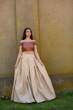 Burgundy and beige striped off-shoulder blouse with gold glass tassel border and back zipper Beige brocade skirt with back zipper Beige, Net dupatta with sequin pattern Beige Lehenga Combination, Stripe Blouse Designs, Cream Lehenga Combination, Blouse Designs For Skirt, Half Shoulder Blouse Designs, Cream Saree Combination, Off Shoulder Blouse Designs, Blouse Skirt Outfit, Cream Skirt Outfit