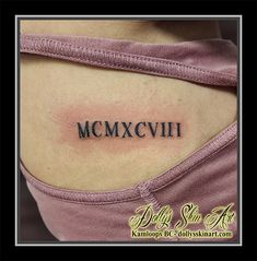 a woman's chest with the word mcmxcvhi on it