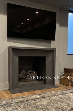 a fireplace with a flat screen tv above it