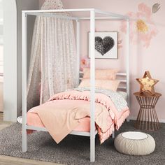 Add a touch of elegance to your bedroom with our Patricia canopy bed—without costing you an arm and a leg. This platform bed frame will stand out and be the centerpiece of your room with its beautiful color, combining old-school glamour aesthetics with a modern structure. Sturdy and well-refined, this tall platform bed features a thick steel canopy frame with a matte finish that brightens any room with ease. In addition to being beautifully crafted, this solid frame is equipped with metal slats Canopy Bed Twin, White Canopy Bed, Beds Twin, Chic Bedding Sets, Metal Canopy Bed, Canopy Beds, Canopy Bed Frame, Bed Twin, The Land Of Nod