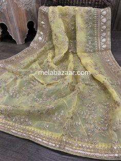 Dress up any outfit with this gorgeous organza embroidered dupatta with a heavy sequins border. Yellow Chinon Dupatta With Intricate Embroidery, Yellow Tissue Silk Dupatta With Dabka Work, Yellow Dupatta With Chikankari Embroidery For Party, Yellow Chikankari Embroidery Dupatta In Chinon, Yellow Chikankari Embroidery Dupatta For Party, Yellow Organza Dupatta For Party, Organza Dupatta With Intricate Embroidery For Diwali, Intricate Embroidered Organza Dupatta For Diwali, Intricate Embroidery Organza Dupatta For Diwali