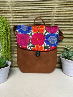 Beautiful Mexican bag with floral embroidery, ideal to use on any occasion. Each bag is uniquely embroidered with bright colors on silk thread. With zipper and adjustable strap About Our Items: Each of our pieces are carefully crafted by artisans from the states of Oaxaca and Chiapas. We ship anywhere in the word, from Tepic, Nayarit, mx. Care Instructions: Please take care to handwash your items in cold water and hang to dry. Inch measure width high depth Festival Shoulder Bag With Multicolor Floral Embroidery, Multicolor Floral Embroidered Shoulder Bag For Festivals, Festival Shoulder Bag With Floral Embroidery, Floral Embroidered Shoulder Bag For Festivals, Bohemian Multicolor Shoulder Bag With Floral Embroidery, Multicolor Floral Embroidered Shoulder Bag For Travel, Multicolor Floral Embroidery Shoulder Bag For Travel, Embroidered Multicolor Bags For Everyday Use, Floral Embroidered Tote Shoulder Bag For Festival