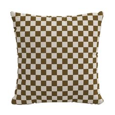 a brown and white checkered pillow on a white background