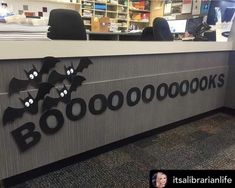 the front desk of a book store with bats on it