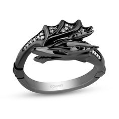 Project confidence and mystery when you wear this diamond dragon wrap ring from the Enchanted Disney Fine Jewelry Villains Collection inspired by Maleficent. Created in sterling silver with black rhodium plate The sculpted dragon head shimmers with a double row of white diamonds along the neck. Completing the bypass design, diamonds shimmer along the webbing of an outstretch wing. This crown-detailed wrap ring attracts attention with 1/8 ct. t.w. of diamonds. Available in size 7 only. This ring Disney Villain Jewelry, Maleficent Wedding, Maleficent Ring, Diamond Dragon, Medieval Things, Nerdy Jewelry, Maleficent Dragon, Masquerade Outfit, Relationship Thoughts