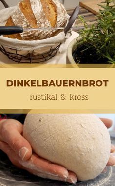 a person holding a ball of bread in their hands with the words dinkelbauernbrot on it