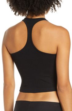 Lounge or layer in this oh-so-versatile ribbed crop top that looks (and feels) great wherever you go. 17" length (size Medium/Large) Crewneck Sleeveless Racerback 92% nylon, 8% spandex Machine wash, dry flat Imported Stretch Seamless Crop Top For Layering, Versatile Seamless Crop Top For Layering, Black Seamless Cropped Crop Top, Black Scoop Neck Bra Friendly Crop Top, Black Scoop Neck Crop Top, Bra Friendly, Black Scoop Neck Crop Top Bra Friendly, Black Scoop Neck Bra-friendly Crop Top, Ribbed Racerback Crop Top, Black Supportive Cropped Top