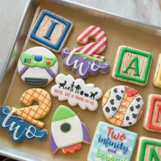 decorated cookies in the shape of letters and numbers