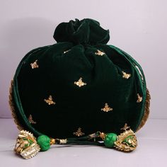 "Green Velvet Fabric Traditional Peacock Embroidered Zardosi Work Bridal Wedding Potli Bag Evening Handbag For Women Material:Velvet Fabric, Golden Metallic Thread, Golden Metallic Wire, Motifs, Sequin Color: Dark Green Package Contents: 1 Size: 10\" x 8\" Designed with the heart, this beautiful Potli or batawa bag are eye catchy and made of premium material. Key Features: Embroidery art work This potli is good match with both Indian and western outfits and are superb for wedding and festive par Bollywood Style Zari Work Bags For Wedding, Bollywood Style Wedding Bags With Zari Work, Bollywood Style Wedding Bags With Dori Work, Zari Work Wedding Bags For Diwali, Bollywood Style Wedding Bag With Dori Work, Wedding Bags With Zari Work For Diwali, Traditional Zari Work Shoulder Bag For Festivals, Green Bag With Zari Work For Wedding, Traditional Resham Embroidery Potli Bag For Festive Season