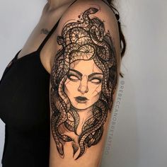 a woman's arm with a snake tattoo on it, and her face is surrounded by snakes