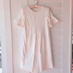 Babydoll White Dress By Anthropologie Lined Never Worn Small Dot Shown In Photos On The Back Of The Dress Bell Sleeves Maternity Mini Dress With Short Sleeves For Spring, White Fitted Casual Maternity Dress, White Fitted Maternity Dress Casual Style, White Cotton Maternity Dress, Feminine Fitted Maternity Dress With Short Sleeves, Feminine Fitted Short Sleeve Maternity Dress, Maternity Midi Dress With Ruffles And Short Sleeves, Casual White Maternity Midi Dress, White Casual Maternity Dress For Spring