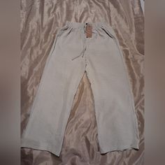 New With Tag Woman's Shein Frenchy Pants Size Small 4. Elastic Waist. Color Off White. Soft Material. Drawstring. Wide Leg. Casual Straight Capris For Loungewear, Beige Comfortable Trousers, Summer Wide Leg Beige Sweatpants, Linen Capris For Loungewear, Summer Beige Sweatpants For Loungewear, Casual Beige Wide Leg Pants For Daywear, Casual Beige Pants For Daywear, Elastic Waist, Pant Jumpsuit