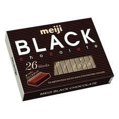 a box of black chocolate on a white background