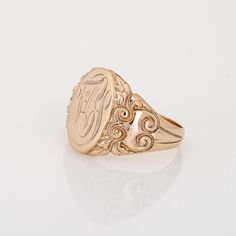 Finely detailed antique Victorian oval signet ring (circa 1880s to 1900s), crafted in 10 karat yellow gold.   The centre oval is engraved in old script with the initials (from what we can decipher) "FCS"   The side shoulders feature a pretty scrolled design, terminating to the oval mount. The saddle of the ring is low and curves to the shape of the finger.     The ring is in very good condition and was recently professionally cleaned and polished.    Particulars:  Weight: 8.2 grammes  Stones:  N Antique Oval Signet Ring For Gift, Oval Antique Signet Ring As Gift, Victorian 14k Gold Signet Ring With Initials, Antique Oval Engraved Ring As Gift, Gold Oval Signet Ring With Engraving Option, Antique Oval Engraved Ring For Gift, Victorian Gold Signet Ring With Initials, Victorian Hallmarked Round Signet Ring, Victorian Style Signet Ring With Intricate Design