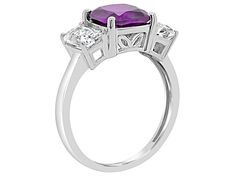 8mm square cushion amethyst and two 6x4mm emerald cut white topaz rhodium over sterling silver 3-stone ring. Measures approximately 0.64" L x 0.32" W. Not sizeable. School Jewelry, Popular Jewelry, Topaz Gemstone, Topaz Ring, Amethyst Gemstone, White Topaz, Turquoise Jewelry, Purple Amethyst, Emerald Cut