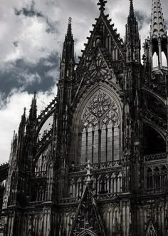 the large cathedral has many spires on it's sides and is very ornate