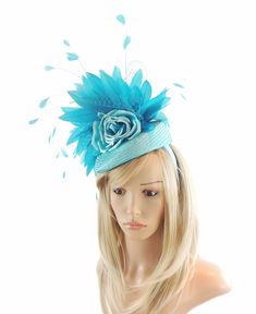 Hats By Cressida Kentucky Derby & Ascot Fascinator Hats Hanneli Kentucky Derby Oaks Fascinator Hat Gorgeous silk rose trimmed with coque feathers and hackle on a pillbox base Base measures about 6 inches wide Mounted with a matching headband. If you prefer a headband to match your hair, please make a note at check out what colour headband you want. We make each hat to order and can add or change colours just email us with what you need. We can also make a custom design for you if you have someth Turquoise Headpiece For Summer Wedding, Elegant Turquoise Fascinator For Wedding, Turquoise Headpieces For Summer Weddings, Elegant Turquoise Headpiece For Wedding, Turquoise Summer Wedding Headpiece, Summer Wedding Turquoise Headpieces, Elegant Turquoise Wedding Headpiece, Spring Turquoise Headpiece For Parties, Turquoise Fascinator For Spring Party