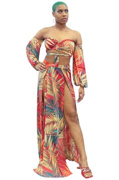 This is a multi-functional, off-shoulder 2-piece maxi skirt set/cover-up that features two deep side splits, long loose puffer sleeves, and a front tie. The maxi skirt has under panties attached. Multicolor tropical pattern. Size range from small to 2x. Great for poolside/vacation wear. Beach Season Maxi Skirt For Beachwear, Beach Season Beachwear Maxi Skirt, Beachwear Maxi Skirt For Party, Beachwear Party Maxi Skirt, Party Beachwear Long Maxi Skirt, Vacation Maxi Skirt With Side Slits, Off-shoulder Maxi Dress For Beach Season, Summer Vacation Maxi Length Sets, Party Beachwear Maxi Skirt