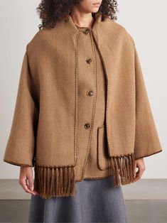 TOTEME Draped fringed wool-blend bouclé jacket Beige Wool Shawl Collar Outerwear, Beige Wool Cape Outerwear, Brown Wool Outerwear With Shawl Collar, Brown Wool Cape For Winter, Brown Cape For Workwear, Brown Cape Outerwear For Work, Brown Cape For Cold Weather, Matching Separates, Cinch Bag