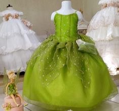 Beautiful green dress, perfect for any special occasion. You could use it as Princess Tiana or Thinker bell. Green Princess Dress For Fancy Events, Green Princess Dress For Fancy Dress Event, Green Princess Style Fancy Dress, Green Princess Style Dress For Fancy Dress Event, Elegant Green Dress For Fancy Occasions, Green Sleeveless Fancy Dress, Green Dresses With Fitted Bodice For Formal Occasions, Green Dress With Fitted Bodice For Formal Occasions, Green Formal Dress With Fitted Bodice