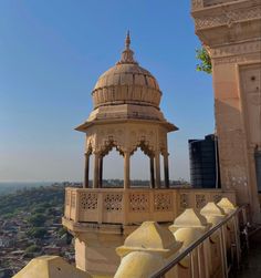 an ornate gazebo on top of a building