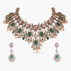 Experience the luxury and elegance of Marutijewelleryindia moissanite grand necklace, a stunning design that combines the brilliance of Moissanite stones, pink cabochon stones & emerald green stones. The Victorian polish gives it a vintage charm, while the pearl and bead drop adds a regal touch. This choker set is ideal for adding glamour to your outfit on special occasions. Product Information  Materials used: 925 Silver with 1.0-microns Victorian Plating Stones: Semi-precious stones & semi-precious beads Length:  Findings: Hook and links Traditional Luxury Hand Set Necklace, Elegant Chandbali Necklaces With Jewels, Elegant Diamond Chandbali Necklace, Formal Chandbali Gemstone Jewelry, Formal Rose Cut Diamond Necklace For Festivals, Elegant Emerald Necklace For Wedding And Festive Occasions, Elegant Festive Emerald Necklace For Wedding, Exquisite Kundan Necklace For Formal Festive Occasions, Elegant Cubic Zirconia Jewelry Sets For Festivals