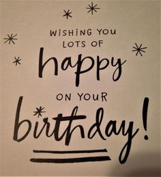 a birthday card with the words wishing you lots of happy on your birthday written in black ink