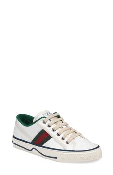 Gucci serves up some heritage style with a low-top sneaker branded with Web striping, double-G sole embossing and retro sport labels at the tongue and footbed. Style Name:Gucci Tennis 1977 Platform Sneaker (Women). Style Number: 6002528. Available in stores. Gucci Sporty High-top Sneakers, Gucci Low-top Platform Sneakers With Branded Insole, Gucci Low-top Sporty Sneakers, Gucci Sporty Low-top Sneakers, Sporty Gucci Sneakers With Contrast Sole, Gucci Lace-up High-top Sneakers With Logo Detail, Gucci High-top Lace-up Sneakers With Logo, Designer Gucci Platform Sneakers With Round Toe, Gucci Designer Platform Sneakers With Round Toe