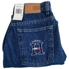 These Vintage Tommy Hilfiger Mom Jeans Are New With Tags. They Are A Medium Wash 100% Cotton Jean. The Back Pocket Has The Embroidered “H” On It. Waist Measures 29”. Rise Is 10.5” And The Inseam Is 29”. Made In 2001. Size 6 Tommy Hilfiger Blue Straight Leg Bottoms, Tommy Hilfiger High Waist Casual Bottoms, Tommy Hilfiger Blue Denim Bottoms, Tommy Hilfiger Denim Bottoms For Spring, Trendy Cotton Tommy Hilfiger Bottoms, Trendy Tommy Hilfiger Cotton Bottoms, Tommy Hilfiger Casual Jeans For Spring, Mom Denim, Vintage Mom