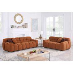 a living room with two couches and a coffee table