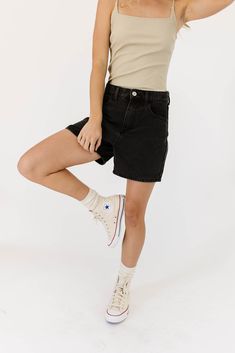 these long black denim shorts will be your new ride-or-dies for every casual summer outfit. with their relaxed fit, mid-rise, + mid-length, these mom-style black shorts are perfect for pairing with tees, tanks, blouses, + crops. a must-have addition to your summer capsule wardrobe. charcoal // high waisted, one button fly zip, pockets, belt loops paired with our oregon tank model is 5'8" + wearing a small measurements are approximate + taken while laying flat small : waist 27” inseam 4.5” length