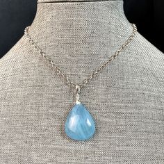 Aquamarine Pendant Necklace. Genuine Teardrop aquamarine pendant. Adjustable Silver Plated Chain.  Material: Genuine Aquamarine Pendant, Silver Plated Chain, or Baroque Pearl Chain Length: 20 inches (adjustable) Elegant Blue Amazonite Jewelry, Blue Natural Stones Teardrop Pendant Necklace, Blue Teardrop Pendant Necklace With Natural Stones, Light Blue Aquamarine Pendant Necklace, Blue Aquamarine Briolette Necklace, Blue Teardrop Pendant With Gemstone Beads, Blue Gemstone Beads Teardrop Pendant Jewelry, Blue Aquamarine Pendant Necklace, Pearl Necklace Pendant