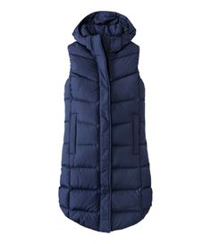 Add cozy warmth and fun novelty to your cool-weather outings with our hooded down vest, in a longer length for extra coverage. Best with midweight layer. Falls at knee. Slightly Fitted. PFC/PFAS-free durable water repellent (DWR). Body and lining: 100% recycled polyester ripstop. Pockets: 100% polyester. Machine wash and dry. Hood: Yes, attached, adjustable hood Water Resistant: Yes Zipper: Two-way front zipper with snap storm flap; can be zipped from bottom for ease of movement. Insulation: 650 Women's Vests, Puffy Vest, Long Puffer, Long Vest, Rain Pants, Blue Vests, Long Vests, Outerwear Vest, Quilted Vest