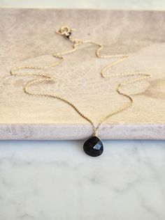 Wire Wrapped Teardrop Onyx Necklace, Black Onyx Necklace, Genuine Black Onyx Necklace, July Birthstone Necklace, Gemstone Necklace, Gold Filled Necklace,Personalized GiftA simple 14 k gold filled necklace that is perfect for elegant everyday wear. The black onyx is facetted and has a discrete shine. About onyx:🌿 Onyx is the birthstone for August and the Zodiac stone for Leo. 🌿 Onyx is the anniversary gemstone for the 7th year of marriage. Black Onyx is the anniversary gemstone for the 10th yea Zodiac Stones, Onyx Pendant, Black Onyx Necklace, Gold Filled Necklace, American Indian Jewelry, Onyx Necklace, Teardrop Necklace, Necklace Gemstone, July Birthstone