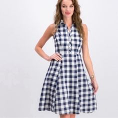 Banana Republic Navy/White Gingham Shirt Dress Approximate Flat Measurements: Shoulder To Hem Length - 38” Pit To Pit - 18” Waist - 15” Material - 100% Polyester Cute, Short , Fit And Flare Dress Is Lightweight.Perfect A Relaxed Look. One Small About 3” Line Marking A Little Below Waist ( Looks Like Print ), Not Obvious Unless You Look For It . Shown In Last Picture. Please See All Pictures And Video For Details. Please Contact If You Have Any Questions Plaid Shirt Dress For Work In Summer, Casual Gingham Plaid A-line Dress, Collared Gingham Dress For Spring, Spring Fitted Plaid Shirt Dress, Classic Gingham Dress, Summer Cotton Plaid Dress For Work, Summer Plaid Shirt Dress For Daywear, Chic Plaid Shirt Dress For Spring, Plaid Shirt Dress For Summer Daywear