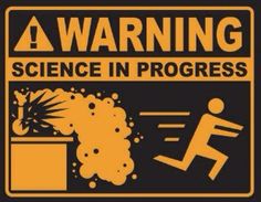 a warning sign on the side of a building that says,'a warning science in progress