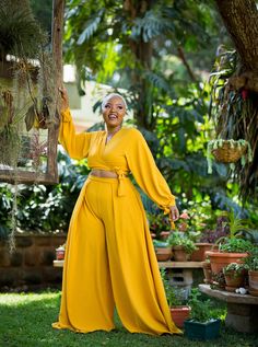 Step into elegance with our Lightweight Palazzo and Wrap Top Set, designed specifically for the modern wedding guest and stylish bridesmaid. This stunning set combines comfort and sophistication, making it the ideal choice for summer weddings, garden and beach parties. The palazzo pants feature a high-waisted, wide-leg design that flows gracefully with every step, offering both freedom of movement and a flattering silhouette. The matching wrap top is versatile and chic, with adjustable ties that allow you to customize your fit and style. Crafted from breathable, lightweight fabric, this set ensures you stay cool and comfortable, even during warm summer events. The Mustard Ahero set features: I. A Breathable Fabric: Crafted from a breathable and flowy crepe fabric blend, our palazzo pants a Dresses Ankara, Shimmer Top, Reception Outfit, Wedding Party Outfits, Couple Dress, Ankara Dresses, Summer Wedding Guests, Palazzo Set, Addis Ababa